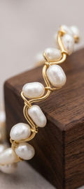 A Drop in the Ocean Signature Bangle | Pearl Wrapped